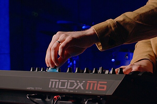 Image showing the CONTROL feature with a performer operating the Super Knob during a live performance