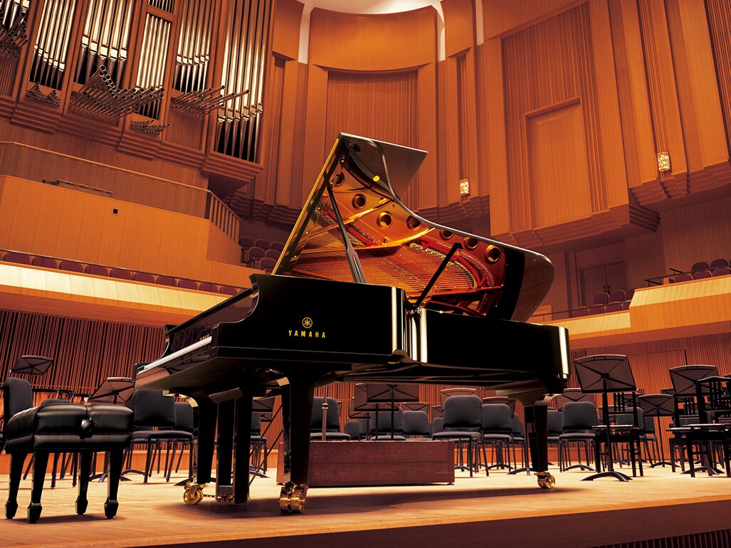 Piano de cauda de concerto Yamaha CFX, utilizado como referência para o som definido, equilibrado e para a ressonância natural reproduzida nos pianos ARIUS.